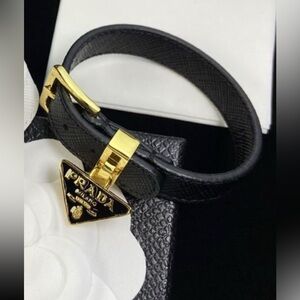 Prada Black bracelet with Gold bracelets with Buckle